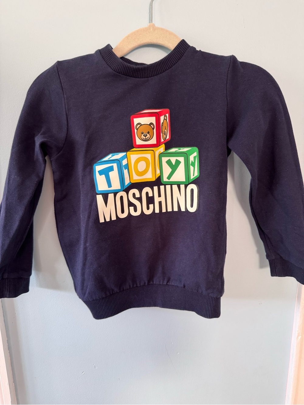 Moschino Navy Baby Sweatshirt with Black Logo Tag
